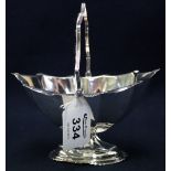 Silver fluted pedestal sucrier with folding handle on crimped edge base. Birmingham hallmarks, 4.