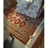Modern red ground Bokhara design carpet. (B.P. 24% incl.