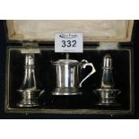 Cased silver three piece cruet set. Birmingham hallmarks, total silver weight approx 2 troy ozs. (B.