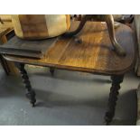 Early 20th Century oak extending dining table standing on barley twist supports. (B.P. 24% incl.