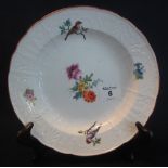 German porcelain relief decorated shallow dish hand painted with birds and floral sprays.