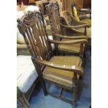 Pair of early 20th Century oak splat and slat backed open armchairs on fluted legs and turned
