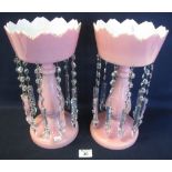 Pair of late Victorian pink glass vase lustres with prismatic droppers and spangles.