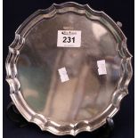 Silver piecrust edge salver with four scroll feet, 10.6 troy ozs approx. (B.P. 24% incl.