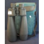 Pair of rubber coated naval type 20:50 binoculars with tinted lenses, modern in canvas case. (B.P.