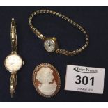 2 ladies wrist watches and a 9ct gold mounted shell cameo brooch. (B.P. 24% incl.