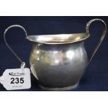 Silver baluster shaped two handled sucrier in Regency style with reeded edging, Chester hallmarks.