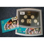 A display panel of Manchester 2002 Commonwealth games medallions. (B.P. 24% incl.