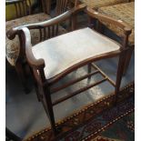 Edwardian mahogany inlaid and upholstered concave shaped stool on square tapering legs. (B.P.