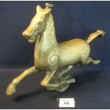 Heavy brass fireside study of a galloping horse in Chinese style. (B.P. 24% incl.