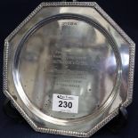 Silver presentation salver of octagonal form with gadroon edge and engraved presentation