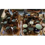 Two trays of copper lustre dresser jugs and other items, miniature tankards, jugs,