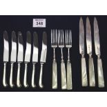 Bag of assorted silver handled dessert knives having pistol grip handles and mother of pearl