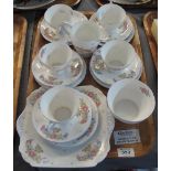 Twenty piece Shelley fine bone china tea service on a white ground with floral sprays. (B.P.