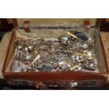 Vintage suitcase, the interior revealing silver plated flatware, cutlery etc. (B.P. 24% incl.