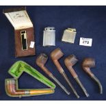 Bag of assorted smoking pipes, cigarette lighters etc. (B.P. 24% incl.