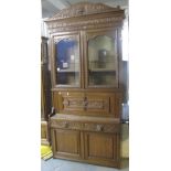 Late 19th/early 20th century carved oak secretaire bookcase. (B.P. 24% incl.