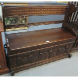 Mid 20th century carved oak hall seat with hinged lid. (B.P. 24% incl.