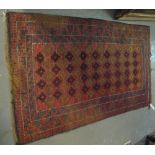Middle Eastern design rug, the central field with geometric design, on a red ground. (B.P. 24% incl.