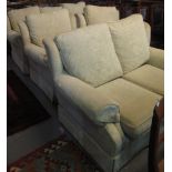 Five-piece modern upholstered cream foliate suite comprising a three seater and two seater sofa,