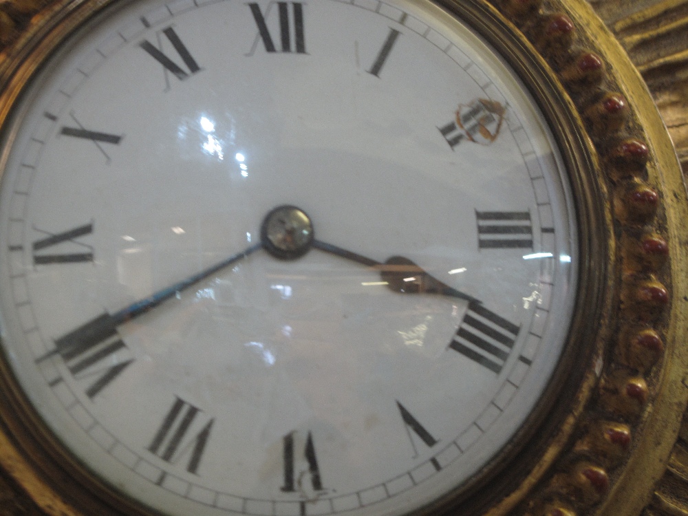 Early 20th century gilt wood sunburst clock having enamel Roman face and French brass back winding - Image 3 of 4