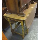 Early 20th century pale oak barley twist gate legged table. (B.P. 24% incl.