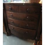 Victorian mahogany bow front chest with two short and three long drawers,