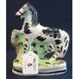 Staffordshire pottery flat backed zebra 16 cm high. (2) (B.P. 24% incl.