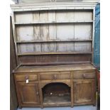 19th century oak two stage rack back pot board dresser. Water damaged. No estimate, no reserve. (B.