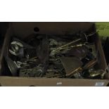 Box of assorted brass ware to include: companion sets, trivet stands, horse brasses,