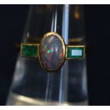 18ct gold opal and emerald ring. (B.P. 24% incl.