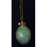 Jade pendant and chain. (B.P. 24% incl.