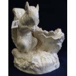 Creamware style squirrel table centre vase on foliate, moulded naturalistic base. Unmarked. (B.P.