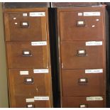 Two similar wooden four drawer office filing cabinets. (2) (B.P. 24% incl.