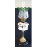 Early 20th century brass double burner oil lamp with ceramic reservoir on brass pedestal and
