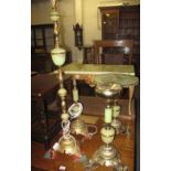 A collection of gilt and onyx furnishing items to include: coffee table, tripod occasional table,