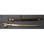 Indian brass hilted, steel bladed, ceremonial tulwar sword with leather brass mounted scabbard. (B.