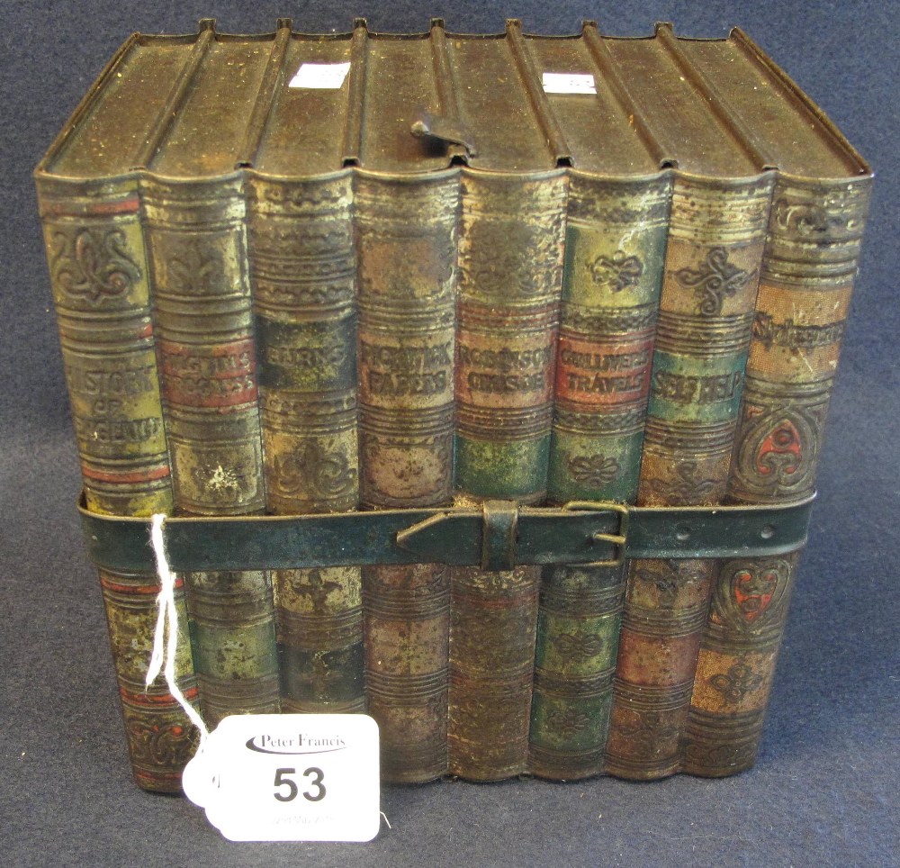 A Huntley and Palmers 'library' metal biscuit tin, moulded with volumes including Gullivers travels,