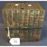 A Huntley and Palmers 'library' metal biscuit tin, moulded with volumes including Gullivers travels,