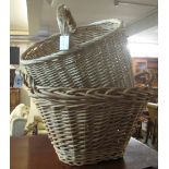 Wicker two-handled hamper, together with another similar wicker basket. (2) (B.P. 24% incl.
