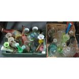Two boxes of assorted coloured and clear glass, to include: candlestick vases,