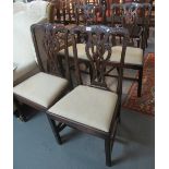 Set of four 19th century mahogany Chippendale style dining chairs with drop in seats on square legs.