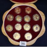 Cased set of twelve gilt metal enamelled medallions depiction the Chinese signs of the zodiac. (B.P.