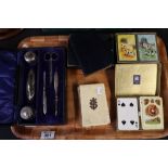 Various sets of playing cards, leather cased pair of prayer and hymn books, another prayer book,