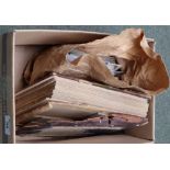 Box with old portrait album of family photographs together with brown bag of various all world