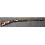 19th century single barrelled percussion shot gun by John Manton having game bird engraved action