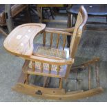 20th century oak and cane child's rocking metamorphic high chair. (B.P. 24% incl.