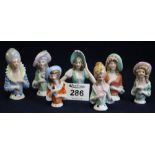Bag of assorted German porcelain tea cozy dolls. (B.P. 24% incl.