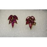 Pair of yellow metal and ruby earrings. (B.P. 24% incl.