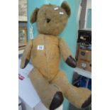 Large and distressed mohair teddy bear with moveable limbs. (B.P. 24% incl.
